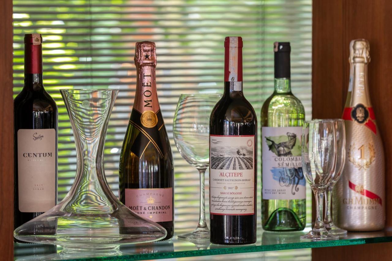Marti Myra Hotell Tekirova Exteriör bild Wine bottles
